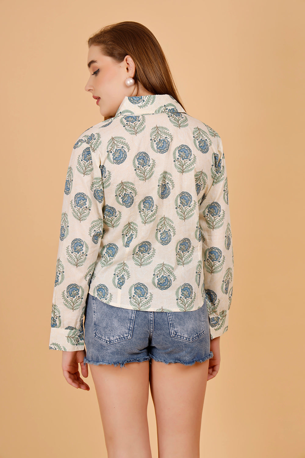 women is wearing a cotton shirt, structured fit to enhance curves, short formal shirt for women, collared cotton shirt for women